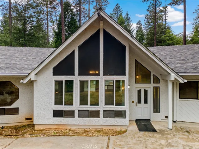 Soaring windows bring in the light and forest views