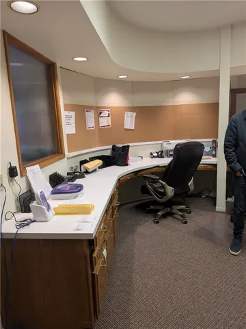 Work Space that had previously been used as a reception area.