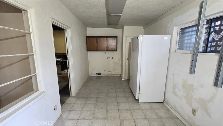 Laundry/Storage Room View 1