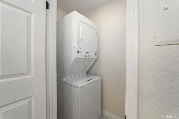 Washer/Dryer in its own room off kitchen.