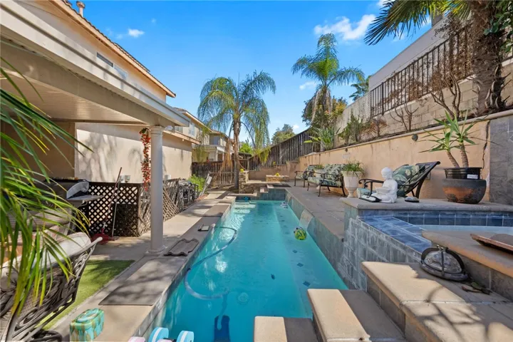 Back yard with pool and jacuzzi