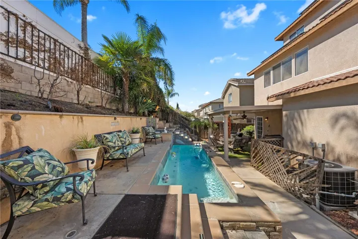 Back yard with pool and jacuzzi