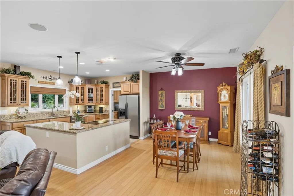2nd home - Dining area & kitchen - hardwood floors throughout