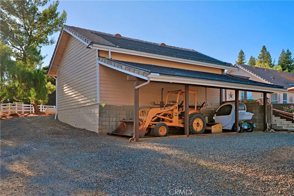 Detached Garage has storage area for ranch implements
