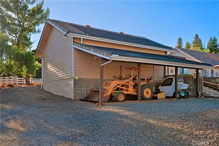 Detached Garage has storage area for ranch implements