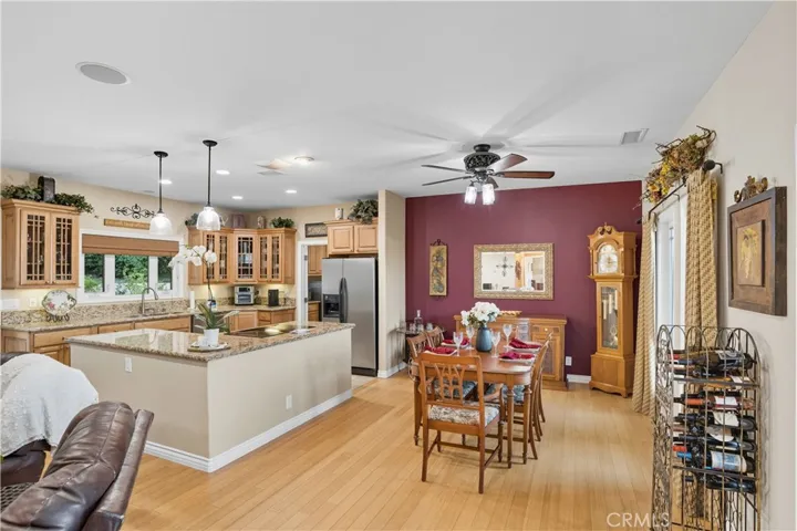 2nd home - Dining area & kitchen - hardwood floors throughout