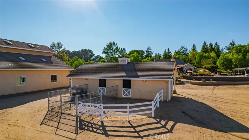 Shedrow barn has turnouts - 1 has high fencing for foaling, or smaller animals
