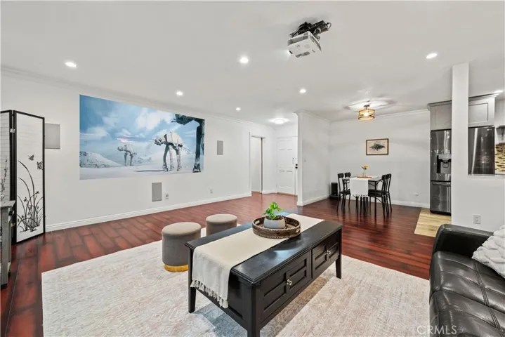 old photo showing projector usage on wall with digital projection image and previous furniture