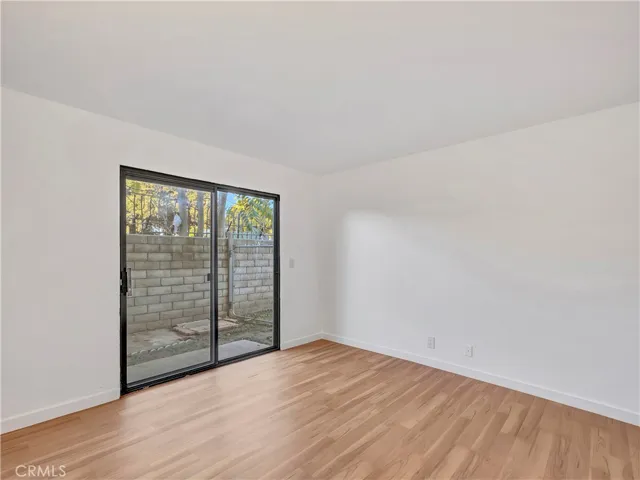Downstairs Bedroom 1 with Access to Patio/Yard