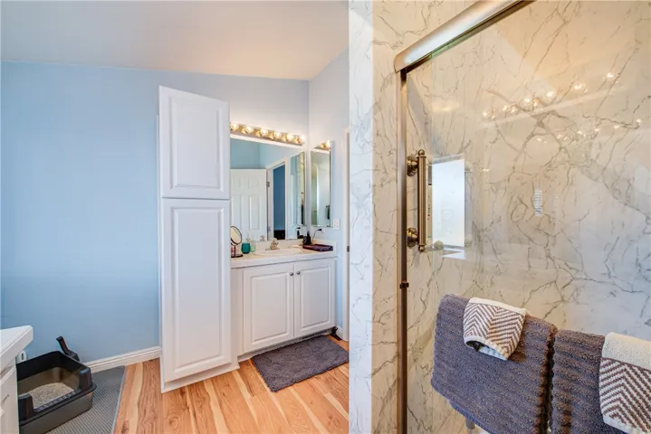 Master bathroom with big remodeled shower and his and hers vanities.