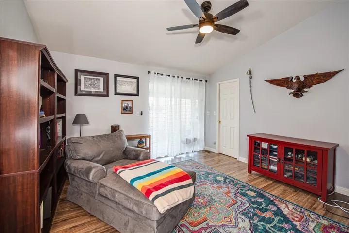 Front bedroom with double door entry, walk-in closet, slider to the patio, also usable as an office/den.