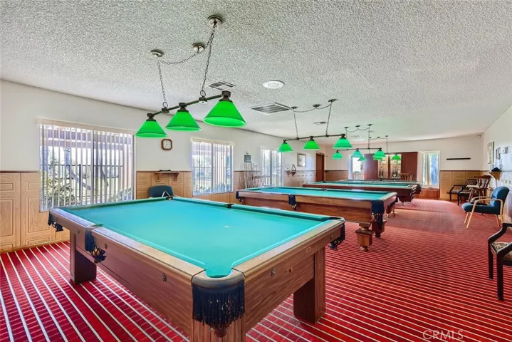 Billiard Parlor with four eight foot tables.