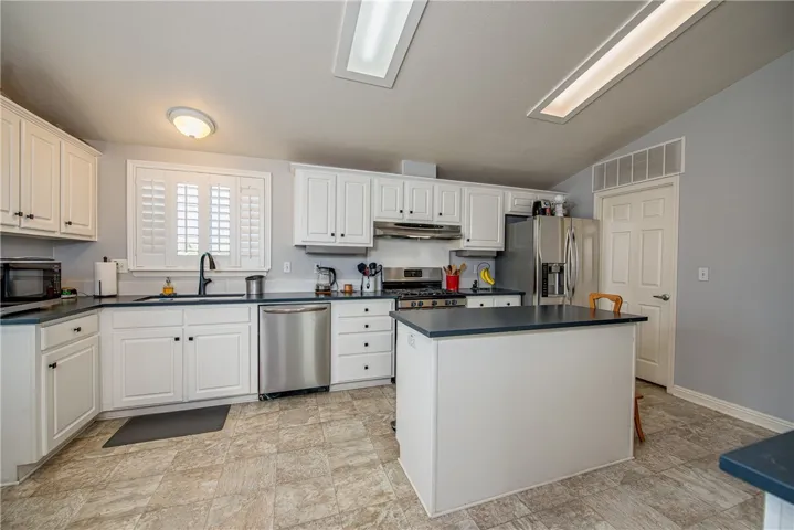 Extraordinary remodeled kitchen with Quartz countertops and backsplashes. Premium stainless steel appliances.