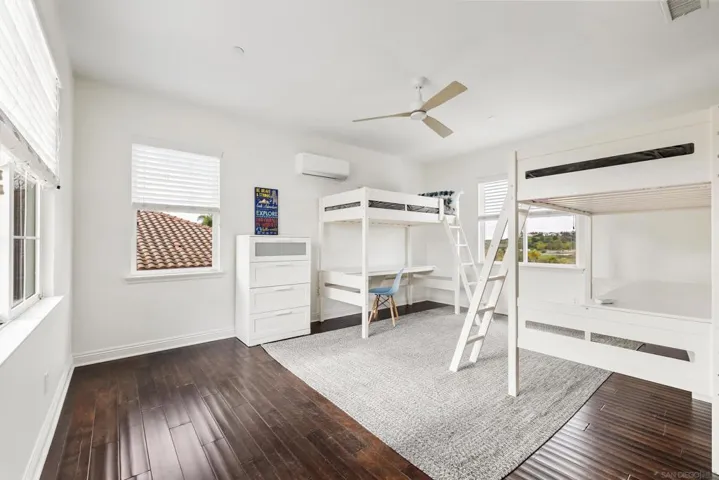 One of two secondary bedrooms shared by hall bath
