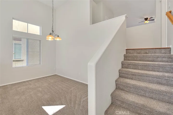 Stairs to the kitchen and the family room