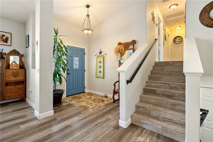 Stepping into the home you are greeted by laminate wood floors that flow throughout most of the main floor.