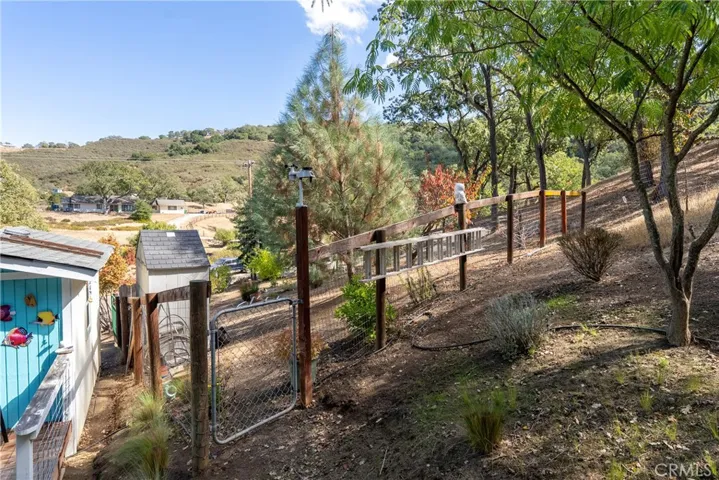 Entrance to the fenced area. There is another small shed in there that could house feed if animals are in the fenced area.