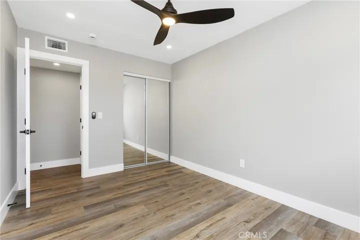 Spacious bedroom ready for a variety of furniture arrangements.