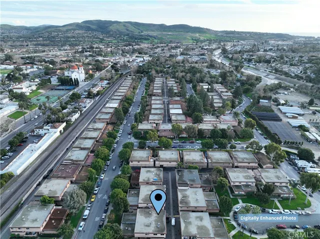 Aerial perspective of the neighborhood and surrounding area in San Juan Capistrano.