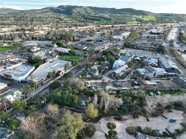Aerial view of central San Juan Capistrano with rolling hills, historic downtown, and convenient access throughout the city.