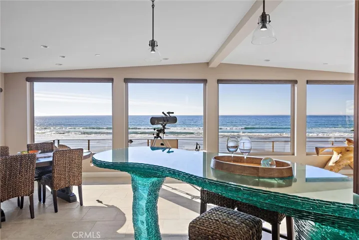 Dining area and extra seating at peninsula.