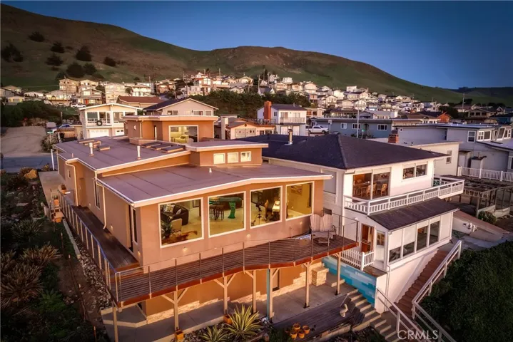 View of home from the beach (drone)