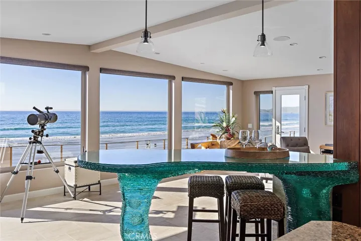 "Wave Inspired" Local artist designed glass peninsula.