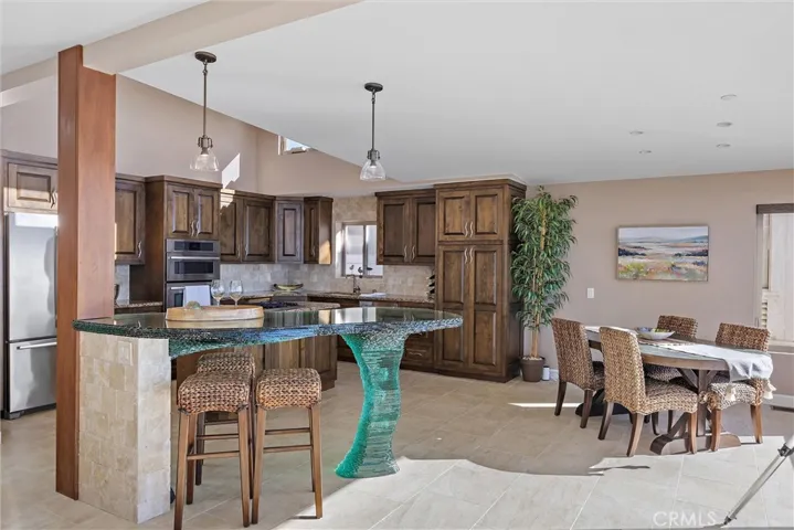 Mingle around the peninsula or sit in the ample dining room space
