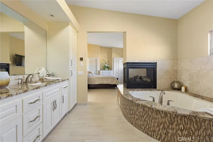 Soaking tub in primary suite