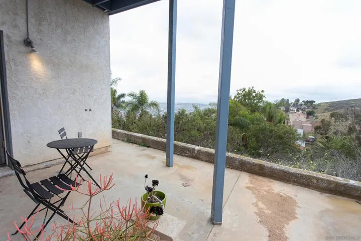 downstairs bonus room has exterior entry and a private patio with views!