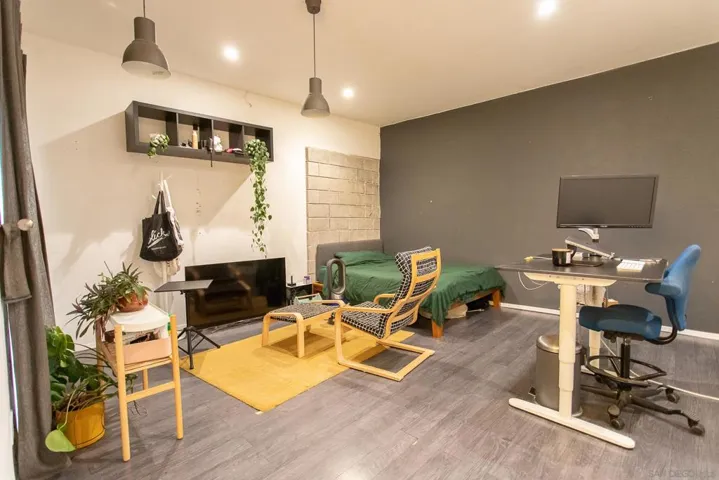 downstairs bonus room has full bath and additional exterior entry.