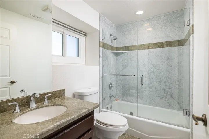 Full bath off of secondary bedroom/exercise room