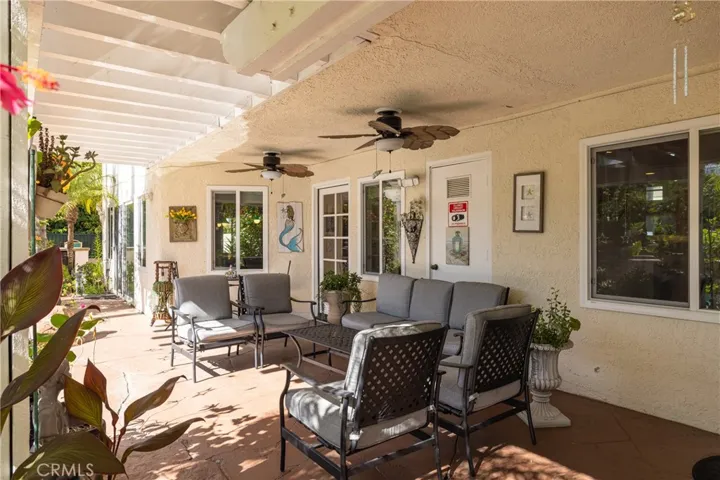 Covered patio space off the kitchen is ideal for hot summer days