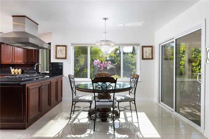 Casual dining area off the kitchen, with direct access to the backyard