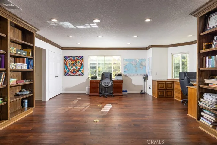 Upstairs office/bonus room with built-in bookshelves