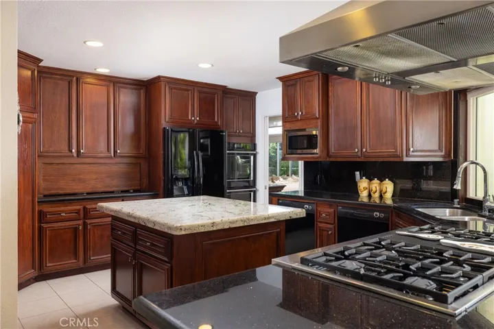 Chef's kitchen with ample storage and custom cabinetry