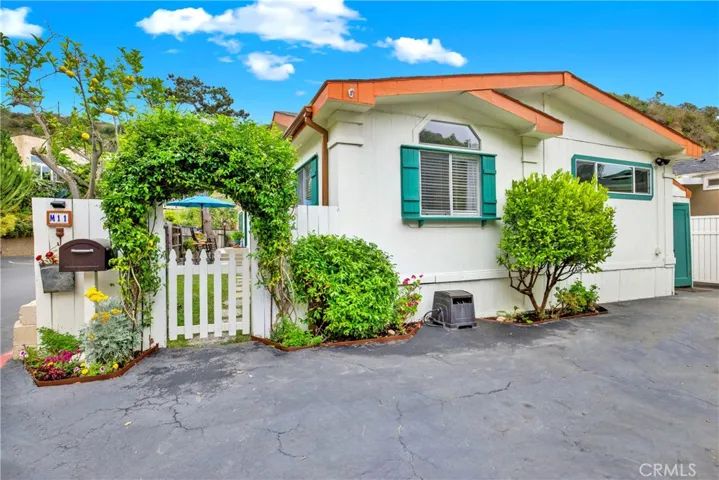 Inviting entrance with beautiful landscaping