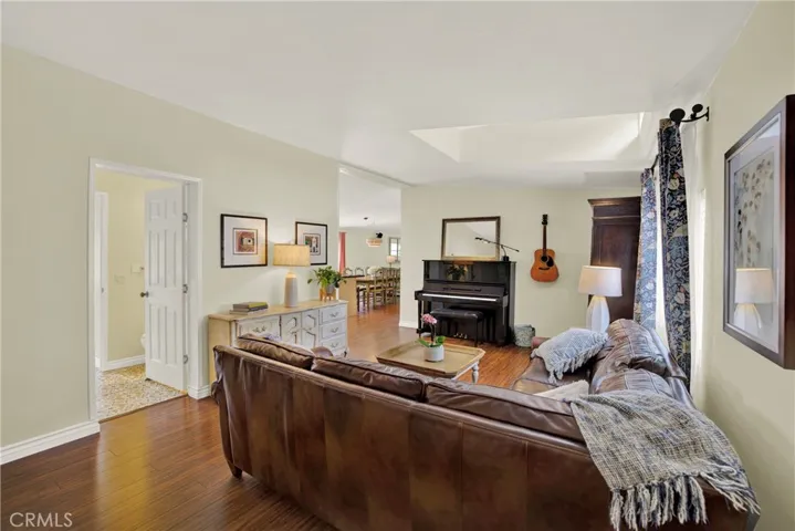 Living room with high ceilings & loads of light