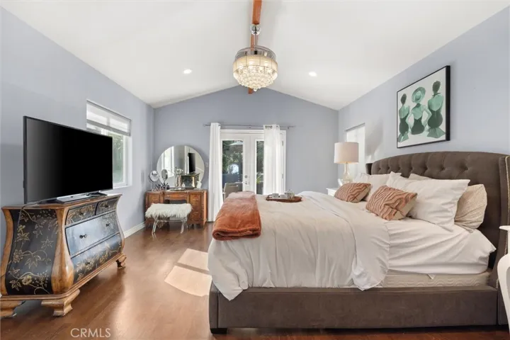 Primary bedroom has direct access to the back patio.