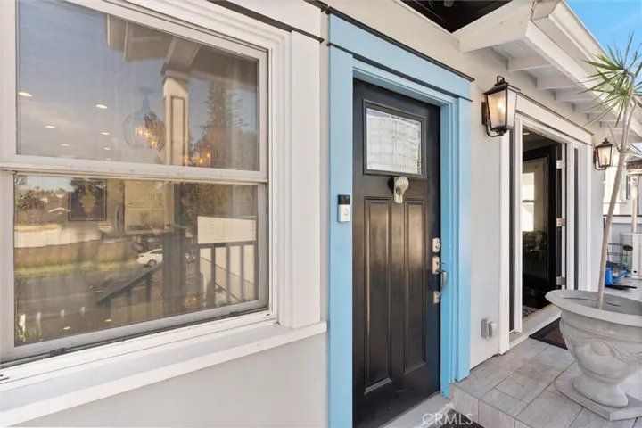 Front door and French doors that open to front patio area