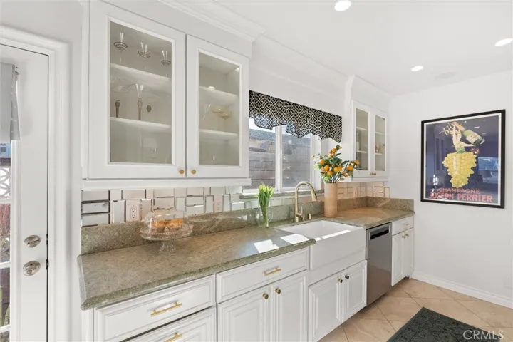 Custom glass display doors in kitchen.