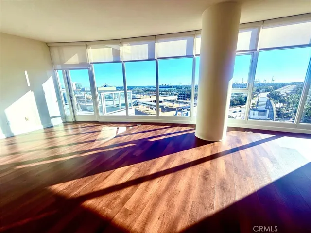 Floor to ceiling windows overlooking the beautiful blue horizon