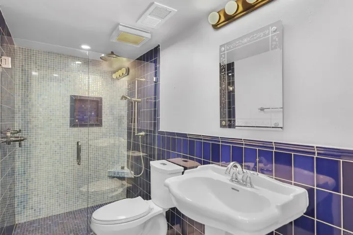Remodeled bathroom with large shower