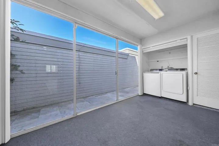 Washer and dryer, storage and access to back patio.