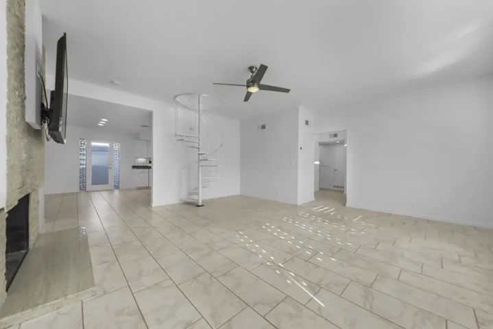 Fireplace, and wall mount TV included in sale.