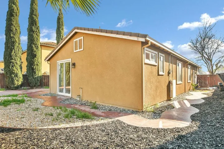 View of home's exterior with stucco siding