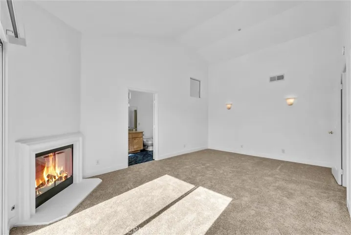 Primary bedroom with fireplace