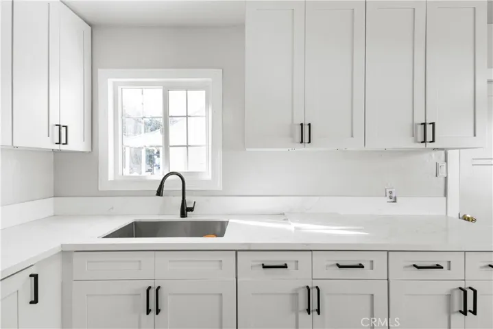 Brand new beautiful counters, cabinets and sink