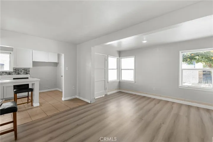 The rear unit features a spacious living room that connects into the kitchen