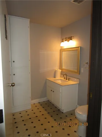 Bathroom with storage closet.
